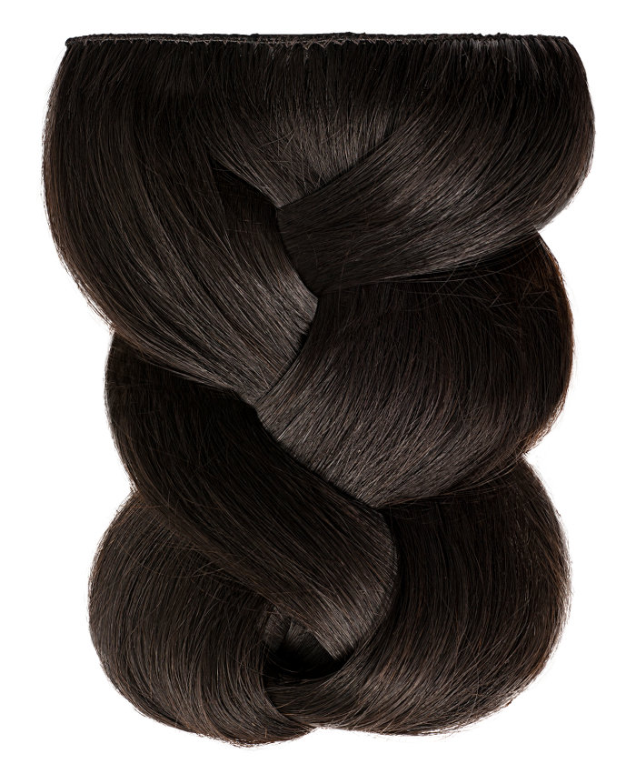 Clip In Extensions | A studio image of a loosely braided black clip-on extension.