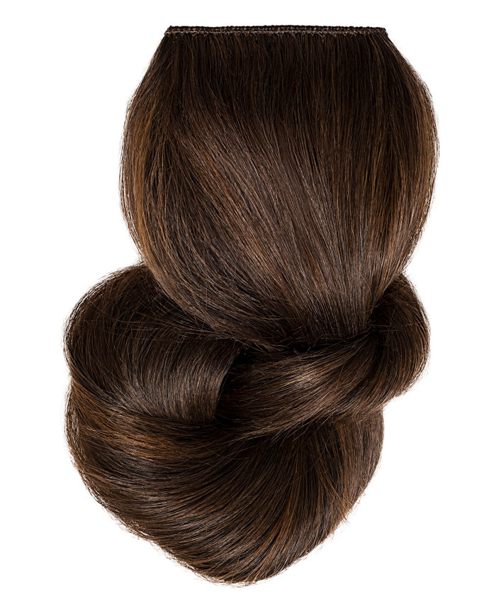 Clip In Extensions | A studio image of a loosely braided dark brown clip on extension.