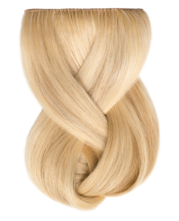 Clip In Extensions | A studio image of a loosely braided platinum blonde clip on extension.